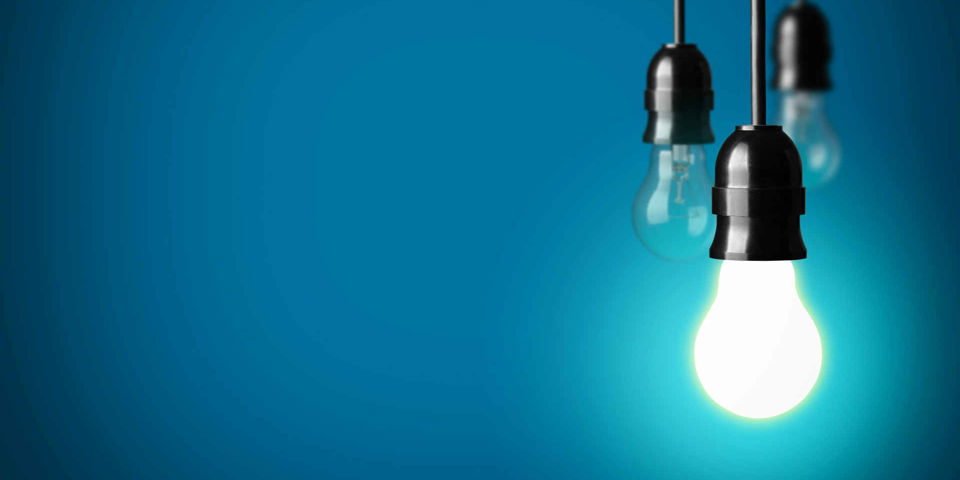 Three light bulbs with one switched on