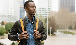 Man looking pensive outside