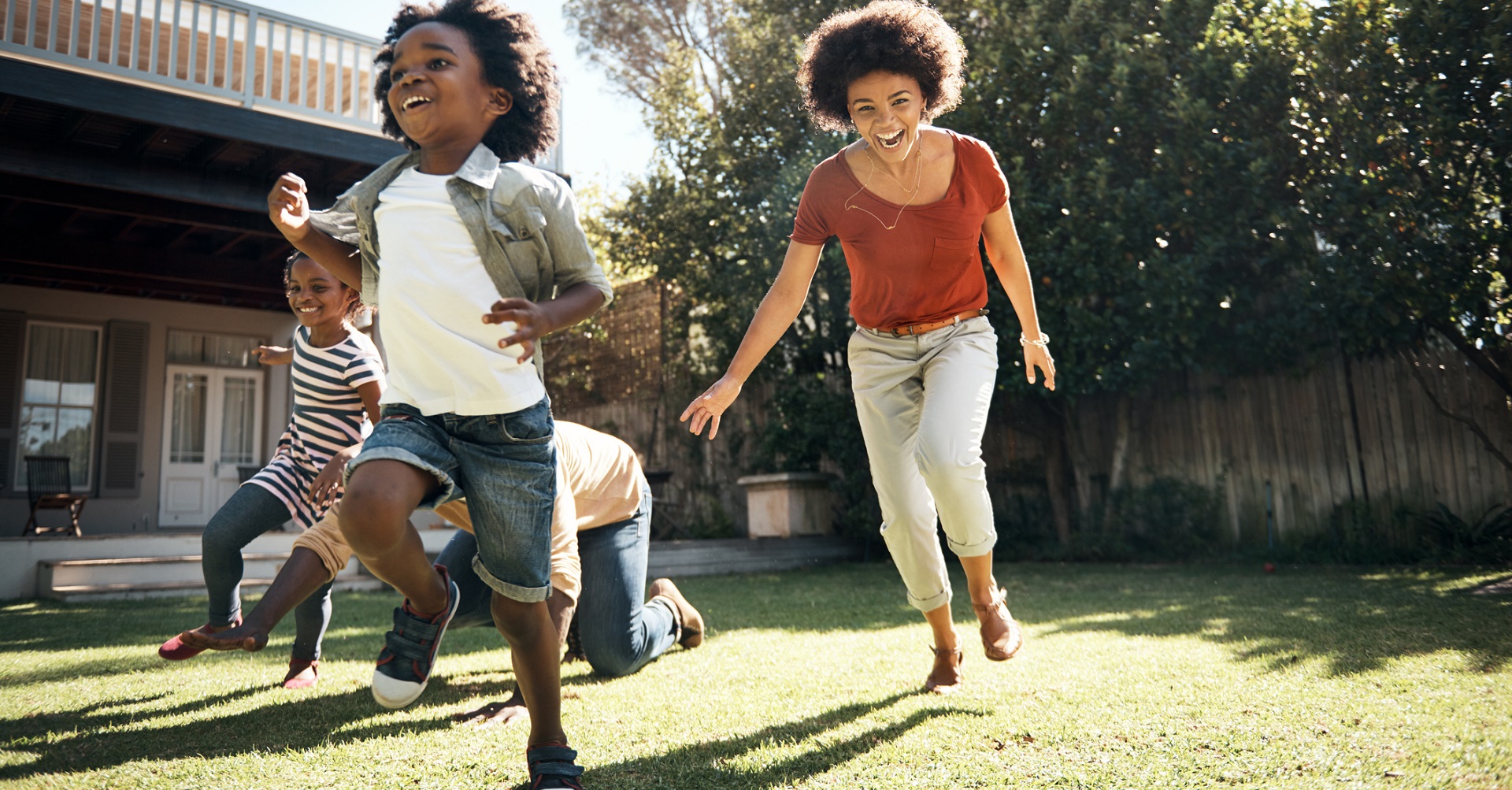 Family playing in the sun