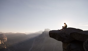 Man sitting on rock