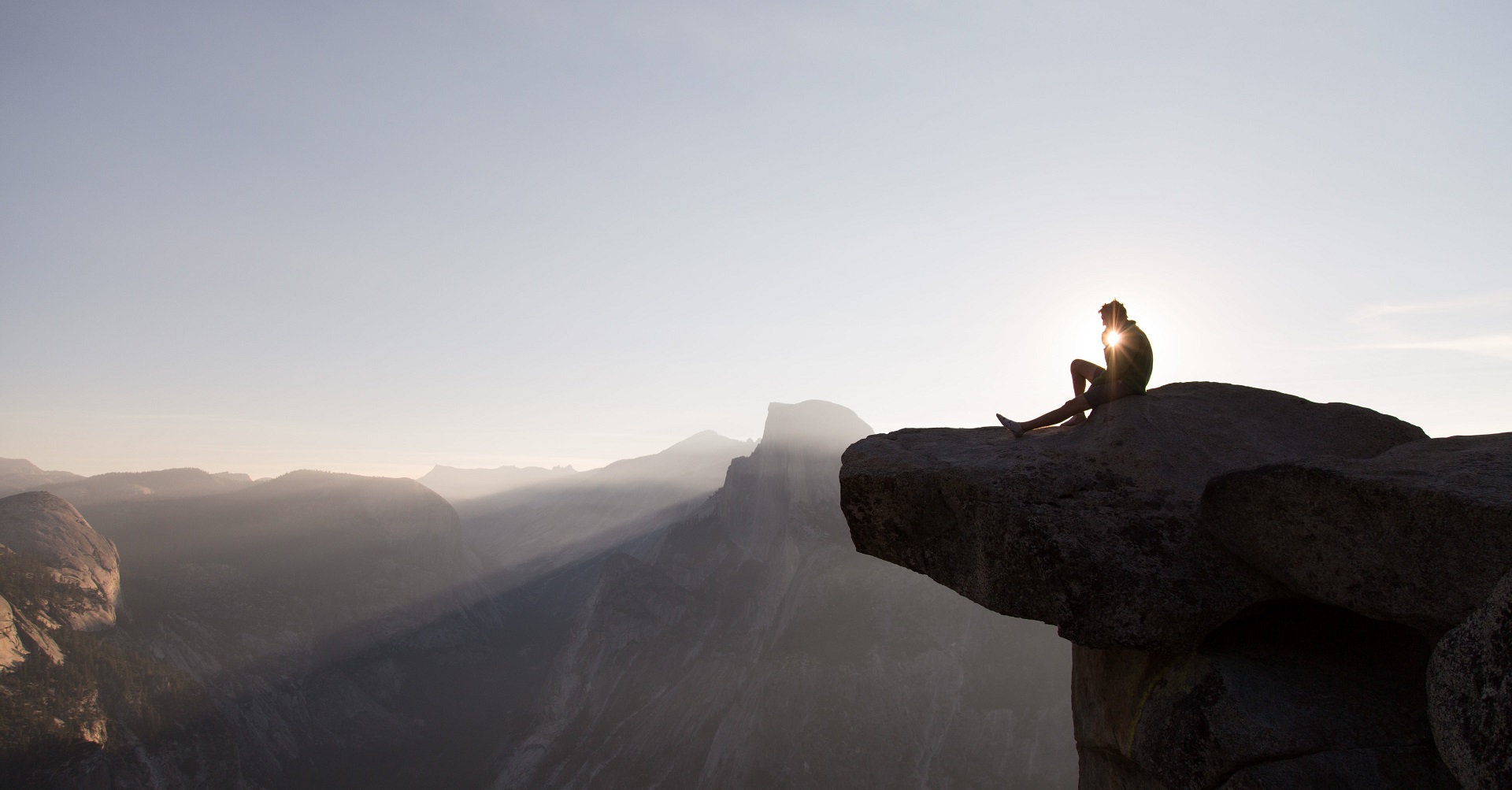 Man sitting on rock