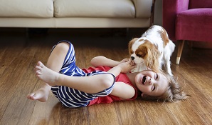 Happy child laying on the floor