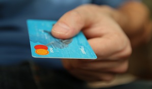 hand holding credit card