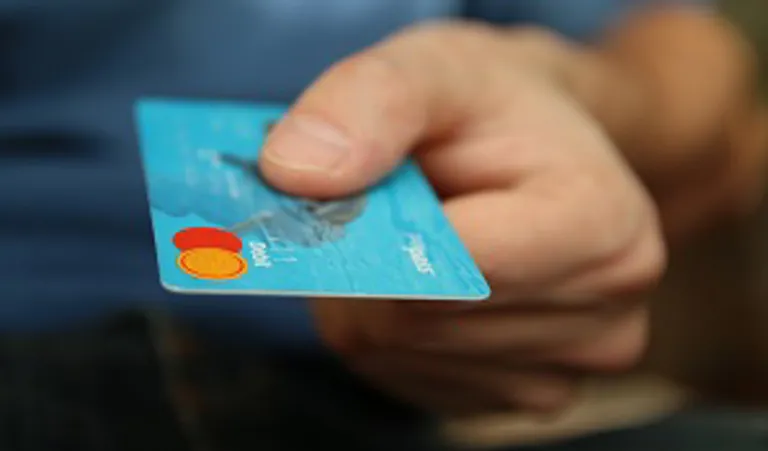 hand holding credit card