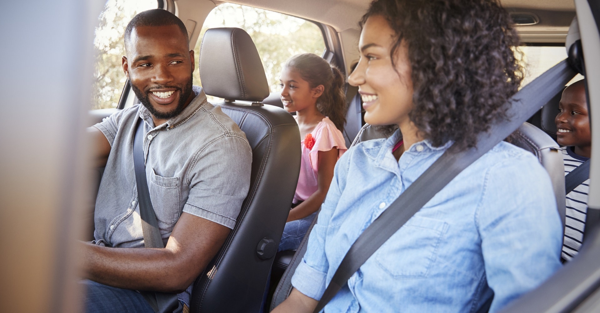 happy family in car