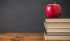 apple on pile of books