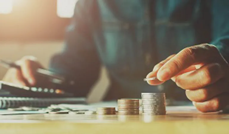 Man counting coins