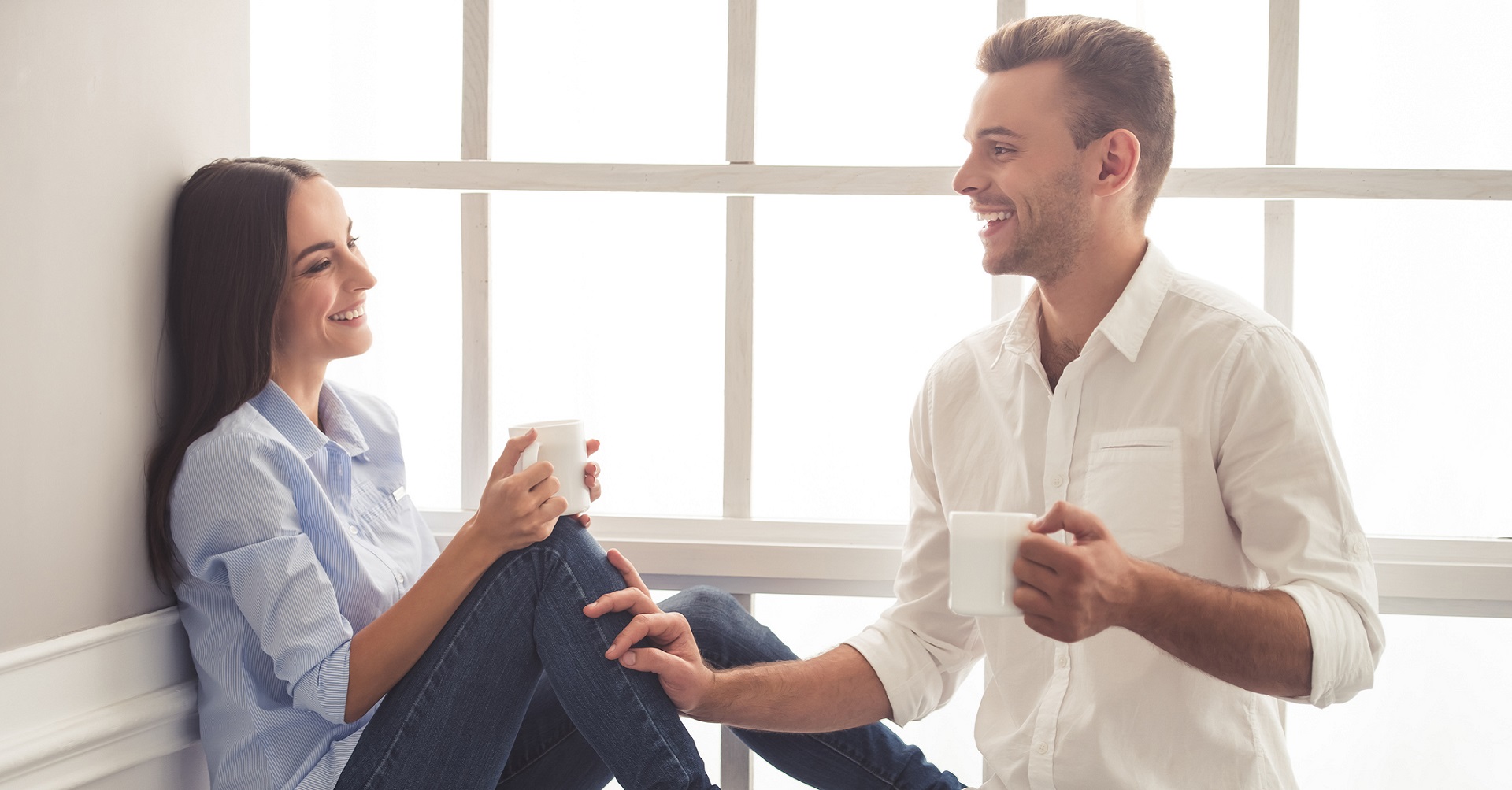 a couple taking over a cup of tea 