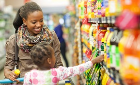 mother and daughter at supermarket