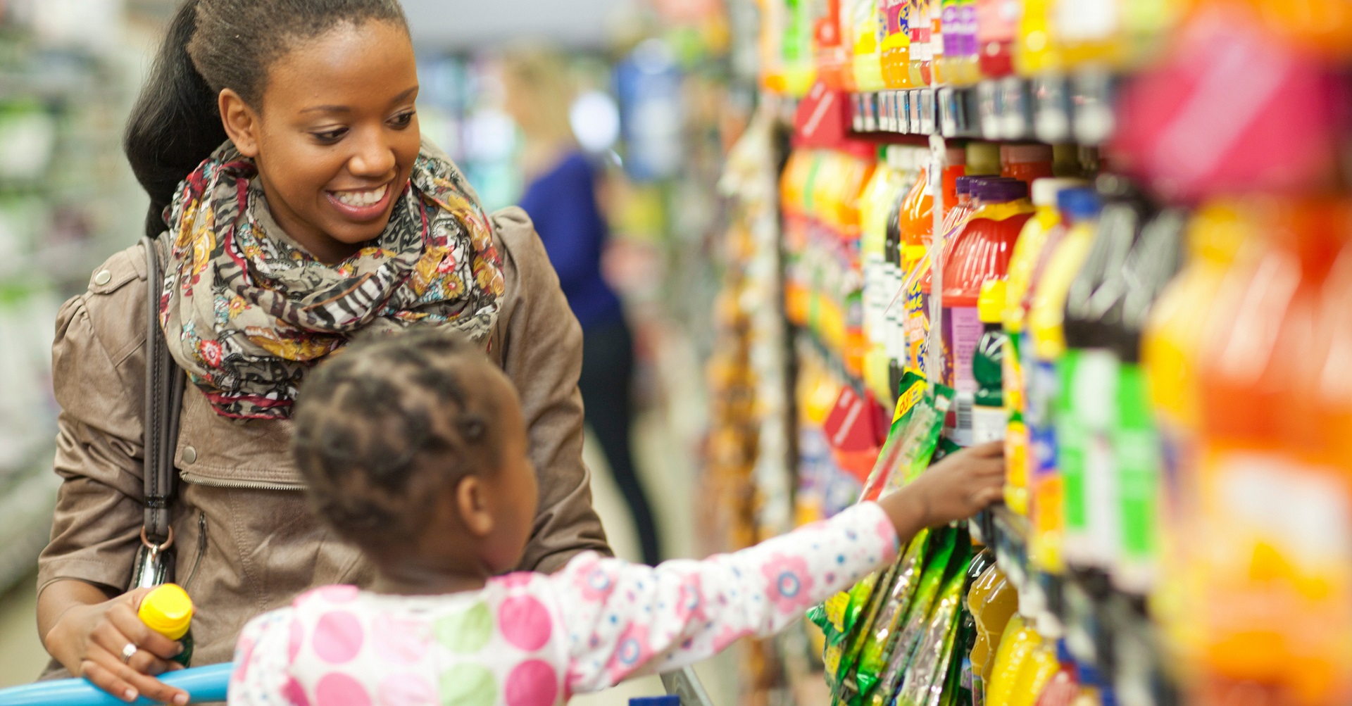 mother and daughter at supermarket