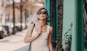 woman smoking e-cigarette