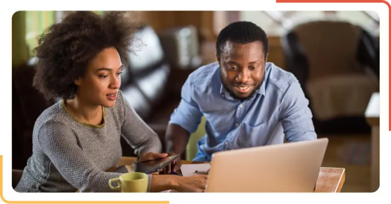 couple looking at laptop