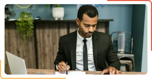 man sitting at desk